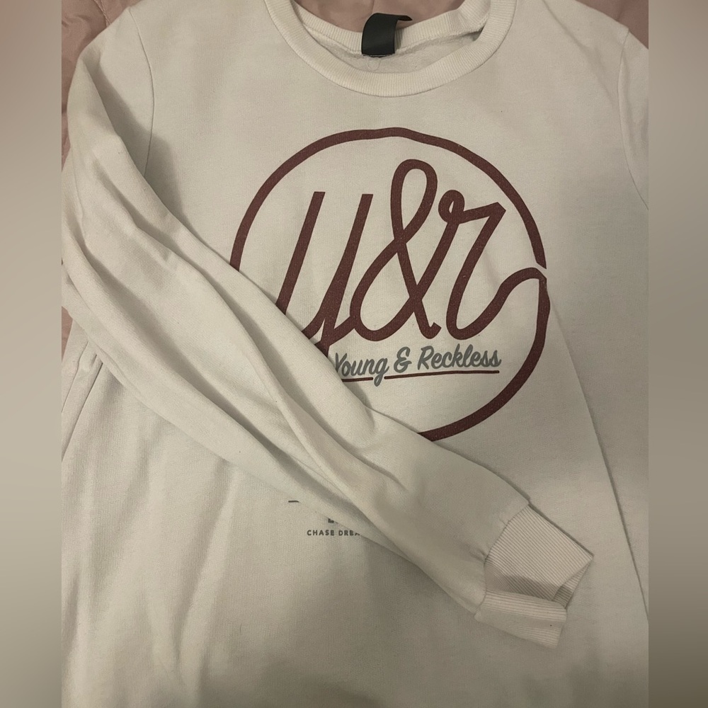 Young and reckless sweater